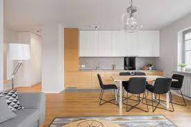 Dining room, glamorous black furnitures of contemporary dining room sets matched with white ceramics wall also flooring furnished with elongated table and completed with cupboard in the design. Dining Room Flooring Ideas Poulin Design Center