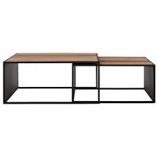 Generally the rule is that your coffee table should be the same height as your couch's seat (give or take one to two inches, but not any lower). Cosmo Coffee Table Square In Teak And Iron Dtp Home Tentation