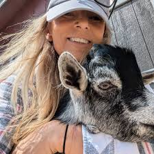 Precious after her morning coffee,.. begging someone to play with her….