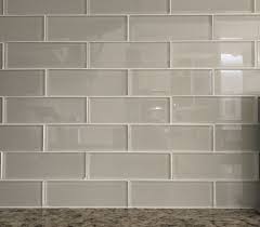 Subway tile grout width and oyster gray grout! Anatolia Bliss Elemental Glass Tile As A Backsplash With White Grout In Sand Love Them But Backsplash Grey Glass Subway Tile Backsplash Glass Tile Backsplash