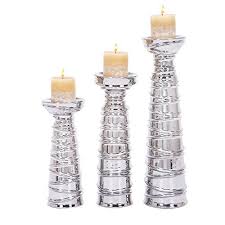 From whimsical animal candle holders to elegant filigree lanterns, there is this pillar candle holder is a modern twist on a rustic design. Urban Designs Designer Silver Ceramic Pillar Candle Holders Set Of 3 For More Information Visit Image Link Note It Is Affiliate Link To Amazon Velas Base