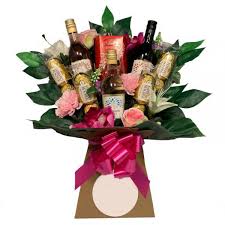 Blossom Hill Wine And Flowers Chocolate Bouquet Our Funky Bouquets Make Great Gifts Fo Chocolate Bouquet Chocolate Christmas Gift Basket Chocolate Gifts Basket