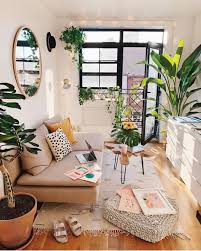 Minimal bedroom with leafy decor and a patterned rug above the bed. New Stylish Bohemian Home Decor Ideas House Interior Apartment Decor Room Inspiration