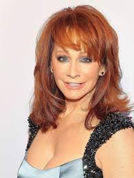 Beautiful Reba Mcintire. The best Country music 🎶🎵. Singer Ever.