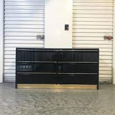 You need enough open unused space behind the wall to accommodate your chest. Vintage 80s Black And Gold Lacquer Dresser 325 22 25 W X 16 D X 22 T Stunning 80s Glam Six Drawer Dresser With Black Lacquer Finish And Gold Metal Trim Good