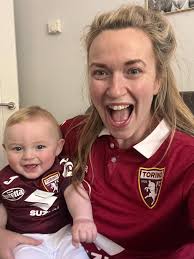 Driving from Venice to Turin. Son will meet us in Milan. Would anyone know  a location with easy access off E64 to pick him up? Milli grazi