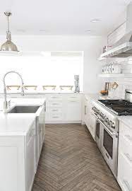 A Bright White Family Friendly Kitchen Room For Tuesday White Kitchen Design Kitchen Floor Tile Kitchen Design
