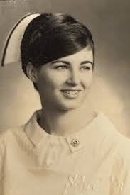 KAREN "KIT" HENDERSON