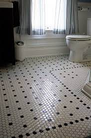 Penny round tiles are used as for floor as to create an accent on the shower's wall ( braswell design+build) blue arabesque tiles for the shower zone. How To Choose The Right Bathroom Floor Tile Ideas For Various Designs Houseminds Mosaic Tile Bathroom Floor Honeycomb Tile Mosaic Floor Tile