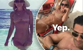 Kelly Ripa's husband Mark Consuelos admires her bikini body 