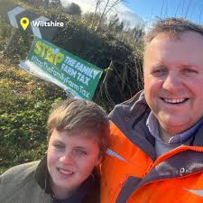 Wiltshire County Chairman Tom Collins and his son showing off their  banner📍 Tag us in your pictures 👏 #StopTheFamilyFarmTax