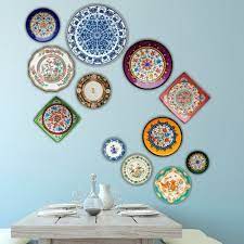 15 Wall Decor Ideas For An Impressive Dining Room Plates On Wall Decorative Wall Plates Plate Wall Decor