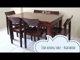 teak wood dining table with most