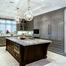 Combining your gray cabinets with white cabinets can provide a much needed contrast while brightening up the entire look. 25 Glamorous Gray Kitchens