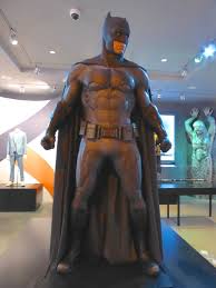 This weathered batsuit has been used by bruce wayne for many years to conceal his identity. Hollywood Movie Costumes And Props Ben Affleck S Grey Batsuit From Batman V Superman On Display