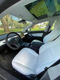 Do you have any pictures of the exterior of the vehicle? Yesterday I Took Delivery Of My 2021 Model 3 Lr White On White Interior I M Getting All Weather Floor Matts Soon And Considering To Tint 30 Since I M In Florida Teslamodel3