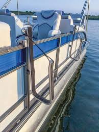 There is hardly any material for the lips to grip to i fear this paneling will pop out of the fence with a slightest bump. Pontoon Side Railing Rack For Holding Stand Up Paddleboards Sups Pontoon Boat Pontoon Boat Accessories Boat Accessories