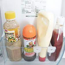 こんな商品欲しかった 100均の ドアポケット用仕切り は冷蔵庫だけでなく小物収納にも便利 冷蔵庫 収納 冷蔵庫 仕切り