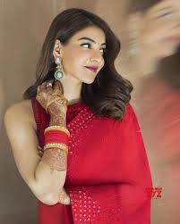 Kajal is looking eye catchy in half saree with backlesss sari blouse and transparent voni from the tollywood flick chandamama. Actress Kajal Aggarwal Latest Stills In A Red Saree Social News Xyz