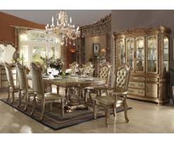 How nice is would it be to get the whole family around the dinner table regularly? Vendome Gold 7pc Formal Dining Set