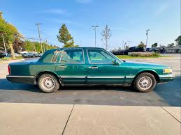 Image result for Ivory 1995 Town Car