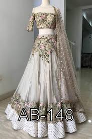 Semi Stitched With Cancan Net Lehenga In An Off White Color Prettified With Embroidery Zari Sequence Indian Wedding Dress Indian Gowns Dresses Floral Lehenga