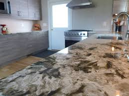 Alpine white from brazil is a primarily cream stone with specs of black and clear colored quartz that blends well with all interiors and design features in bathrooms, kitchens, and outdoor spaces. Pin By Accent Countertops On Kitchens By Accent Interiors White Granite Countertops Alpine White Granite Countertops Granite Countertops