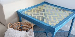 As you can see, each box can face outward to provide extra storage shelves, while the stunning stained wood surface offers a place for drinks and more. Remodelaholic Diy Gold Leaf Glass Table Top