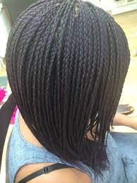 Feather Braids With A Hint Of Purple Braided Hairstyles Hair Styles African Braids Hairstyles