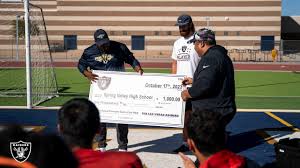 Photos: Raiders hype up local Las Vegas high school football teams
