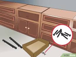 Storing books in rainbow order is a polarizing topic, but can anyone deny how awesome it looks? How To Install Sliding Shelves In Kitchen Cabinets With Pictures