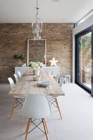 Table Brick Wall Dining Table White Furniture In 2020 Wall Dining Table Dining Room Design Brick Decor