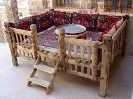 من التراث العراقي صورة ومعلومة التخت او ما يسمى بالقلطغ او القنفة او تختخانة وهو نوع من المجالس التي تصنع من الخشب ويقعد baghdad iraq wood carving art baghdad