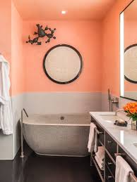 A beautiful spacious bathroom has a combination of beige and gray colors. Drake Anderson Incredible Bathroom Designs That Impress