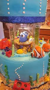 The Middle Of The Finding Dory Cake The Little Fish Bowl Is From Hobby Lobby I Glued A Stick Up L Boy Birthday Cake Finding Dory Birthday Party Dory Birthday