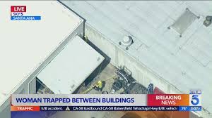 The quest doesn't progress and i'm stuck. Naked Woman Gets Stuck Between Two Buildings In Santa Ana Indy100
