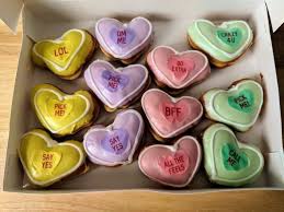 Krispy kreme saves valentine's day with conversation heart doughnuts. A Look At Krispy Kreme S Valentine Conversation Donuts The Yellow Heart Donut Contain Cake Batter Filling The Green Ones Conta Krispy Kreme Donuts Valentine
