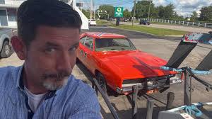 Yee haw. Cooter Davenport's garage has this car hooked up to the tow truck.  I resisted buying the bumper sticker that says “I ❤️ Cooter.”
