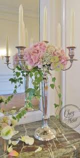 centre de table chandelier hortensia et lierre https www facebook com decochezfleur centre de table chandelier fleurs mariage deco mariage