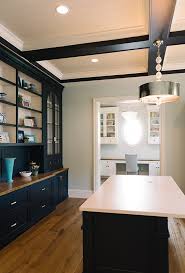 In this small apartment, the dining area has a deep teal blue accent wall that ties in with the front door and storage closet, while the wood furniture adds a natural touch and the black chairs match the black framed glass wall of the bedroom. Inspiring Interior Paint Color Ideas Home Bunch Interior Design Ideas