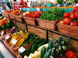 Person giving fruit to another, vegetables stall, vegetables stall. Farmer S Market Downtown Naples Naples Marco Island Everglades