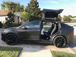 Black And Gold Carbon Fiber Wrap Tesla Model X Black Satin Gold Dust Vinyl Wrap With Carbon Fiber Accents On Chrome And All 6 Seat Backs With Images Tesla Model X Tesla Model Tesla