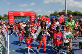 15 action shots showing family fun at the Junior Great Birmingham Run 2026