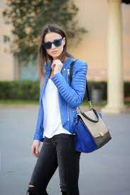 Women S Blue Leather Biker Jacket White Crew Neck T Shirt Charcoal Ripped Skinny Jeans Blue Suede Satchel Bag Blue Leather Jacket Fashion Leather Jacket Outfits