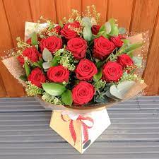 Roses in a garden at sunset. Red Rose Flower Bouquet Delivered In Bath Flowers Of Bath