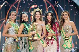 The contestants were staged against a backdrop. Nick Verreos Sashes And Tiaras Miss Grand International 2017 Finals Winner Miss Grand Peru The Gowns Recap