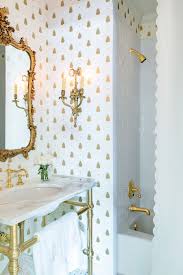 Houzz carrara marble bathrooms with gold fixtures shower. 18 Gorgeous Marble Bathrooms With Brass Gold Fixtures Marble Bathroom Gold Bathroom Bathroom Feature Wall