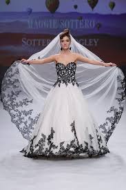 An off shoulder fitted gown with removable waist tie. Something Black Wedding Dress For The Unique Bride Love Maggie