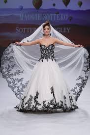 An off shoulder fitted gown with removable waist tie. Something Black Wedding Dress For The Unique Bride Love Maggie
