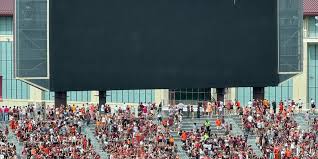 Skydiver rescued after crashing into Virginia Tech scoreboard during spring game